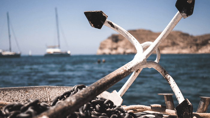 What is the Major Danger of Anchoring a Fishing Boat from the Stern